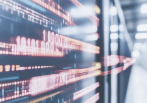 High-tech data center with glowing binary code on a digital screen